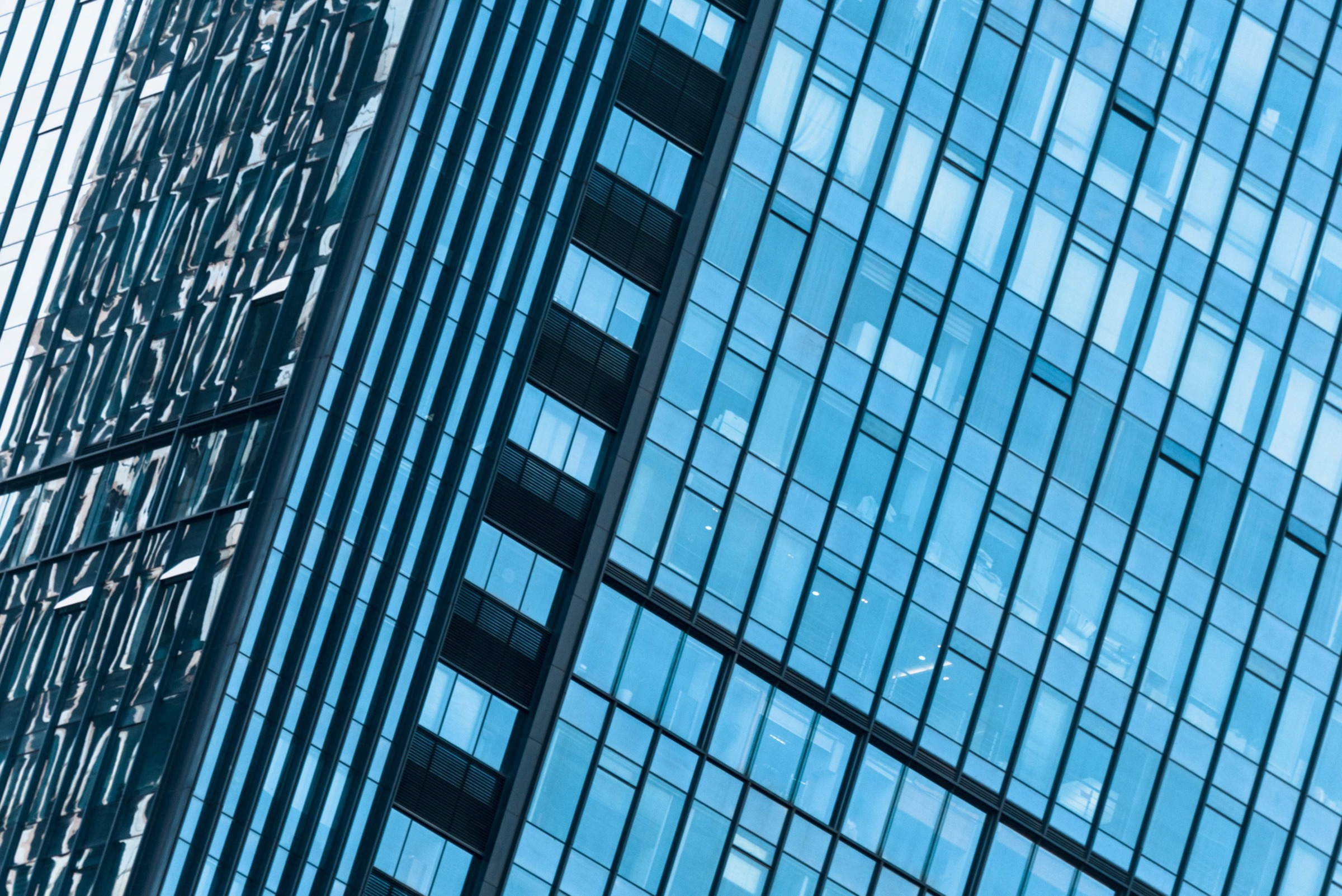 Close-up detail of a modern Grade A office building glass facade